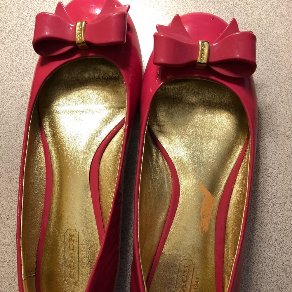 Coach pink SKyla patient leather flats